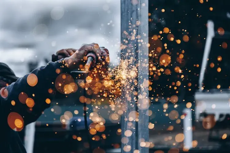 Sparks flying at a construction site.