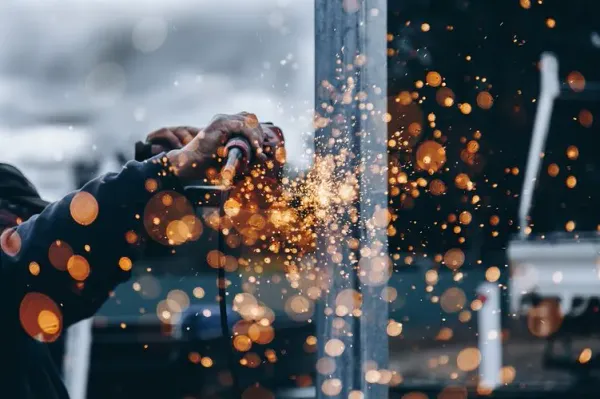 Sparks flying at a construction site.